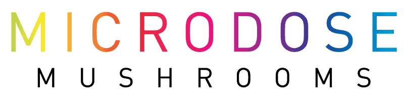 The word "MICRODOSE" in colorful gradient letters above the word "MUSHROOMS" in black capital letters on a light background.